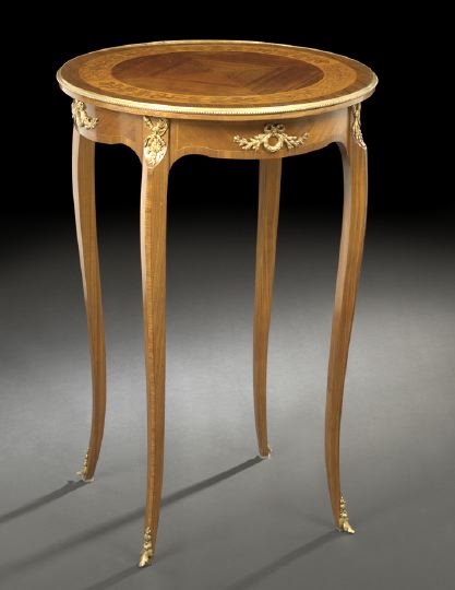 Appraisal: Louis XV-Style Mahogany and Kingwood Occasional Table the quarter-veneered circular