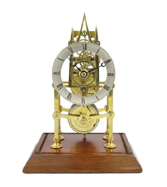 Appraisal: A mid th Century gilt brass skeleton clock with Gothic