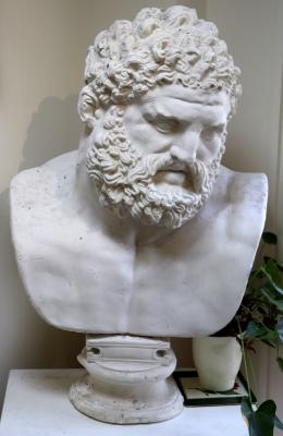 Appraisal: A large plaster bust of a Classical male on socle