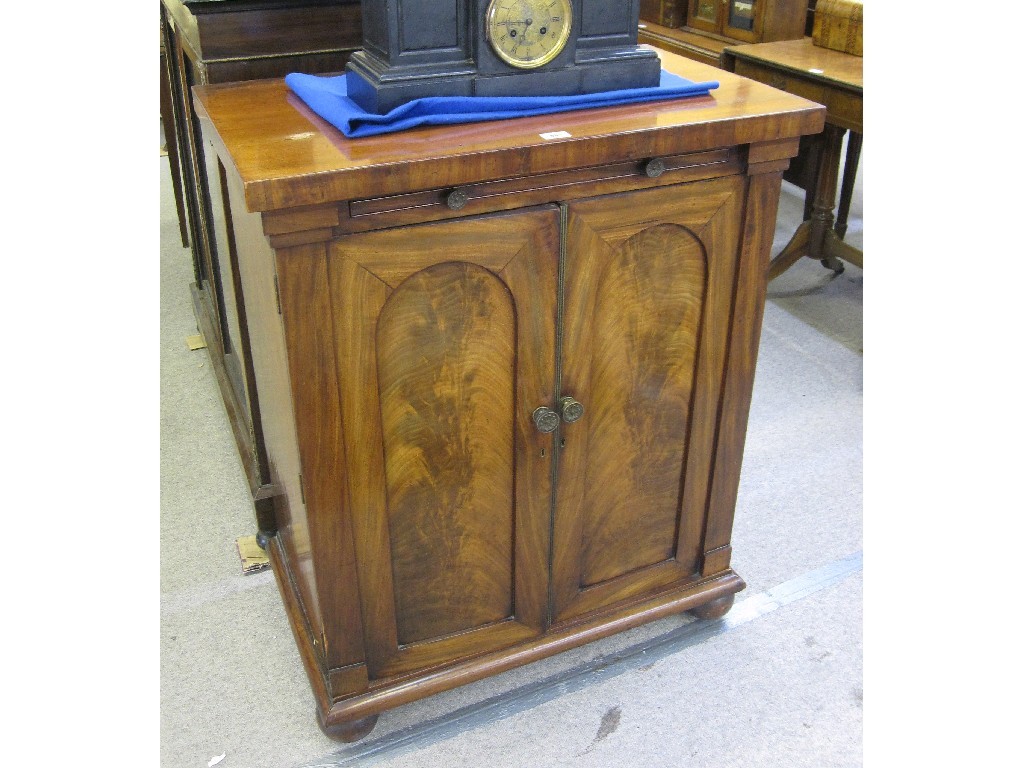 Appraisal: Mahogany side cabinet with brushing slide the interior fitted with