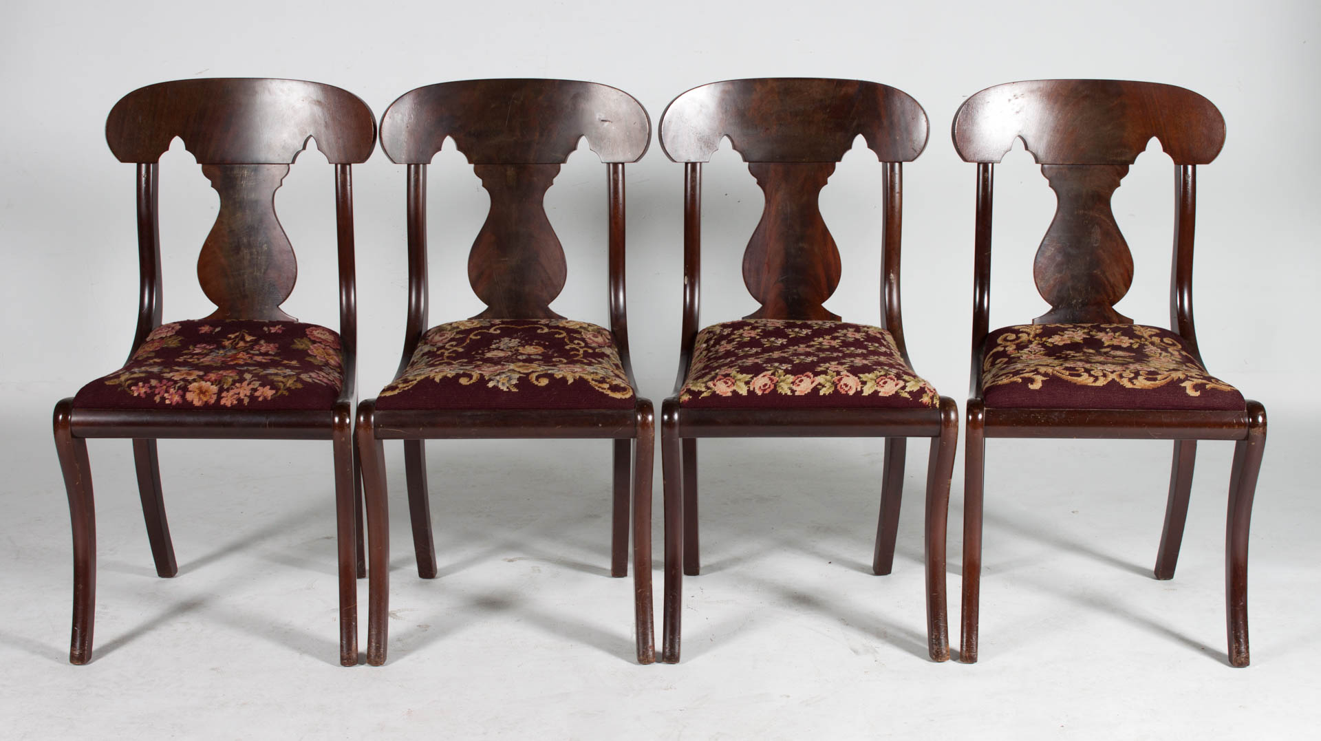 Appraisal: Classical style mahogany Klismos chairs th century Biggs Furniture Co