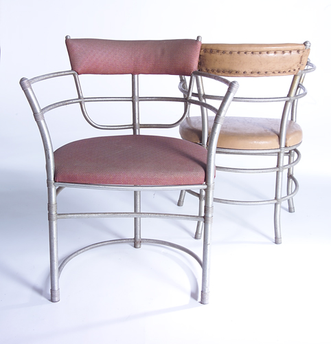 Appraisal: WARREN McARTHUR Two barrel-back tubular aluminum armchairs with original upholstery