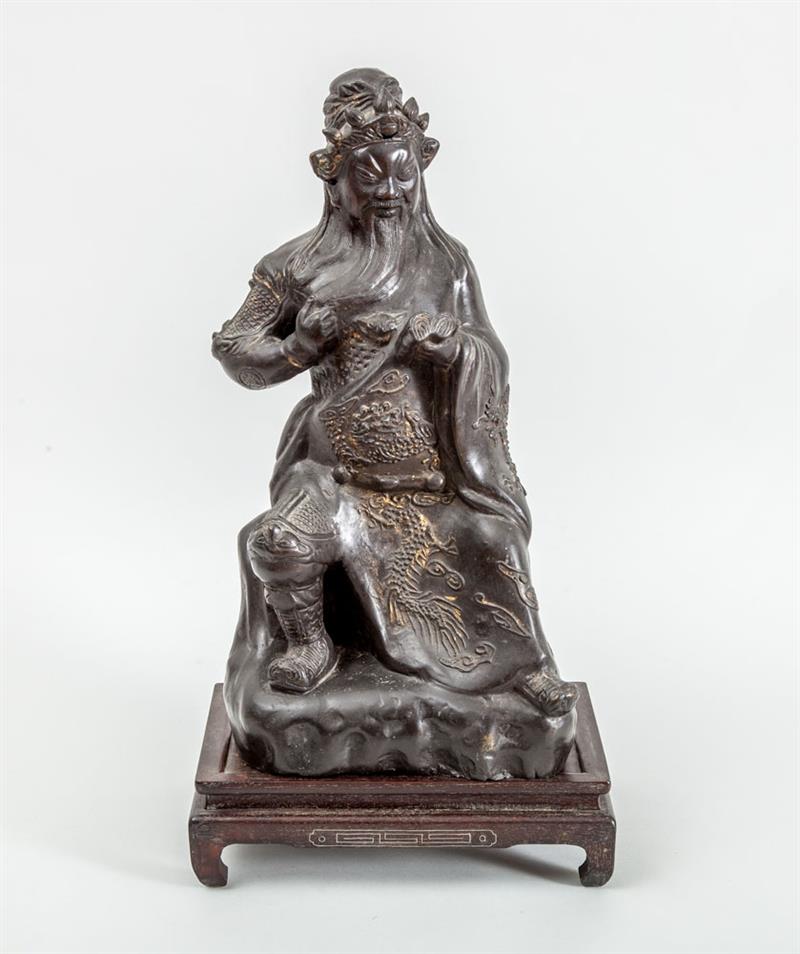 Appraisal: CHINESE BRONZE PATINATED METAL FIGURE ON STAND The bearded figure