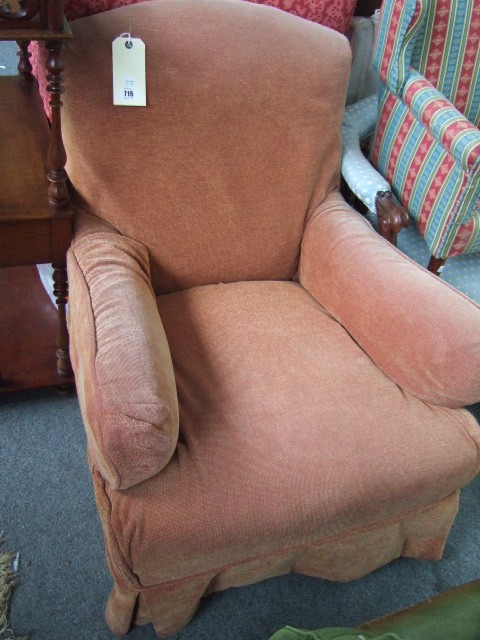 Appraisal: A Victorian deep seated armchair raised on turned mahogany front