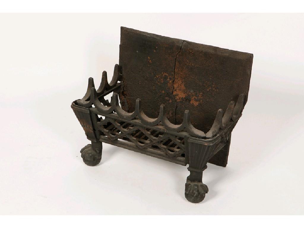 Appraisal: A CAST IRON GOTHIC REVIVAL FIRE BASKET with a rectangular