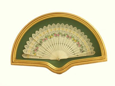 Appraisal: An English small ivory bris fan c with pierced sticks