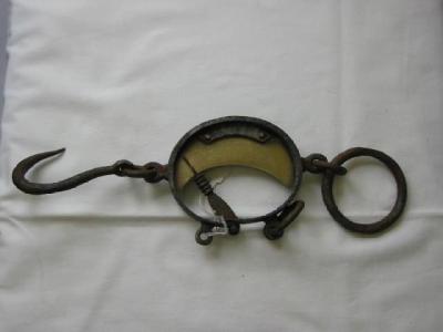 Appraisal: A WROUGHT IRON WOOL GAUGE of oval form with brass