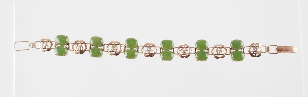 Appraisal: K yellow gold and jade hardstone bracelet with Chinese characters