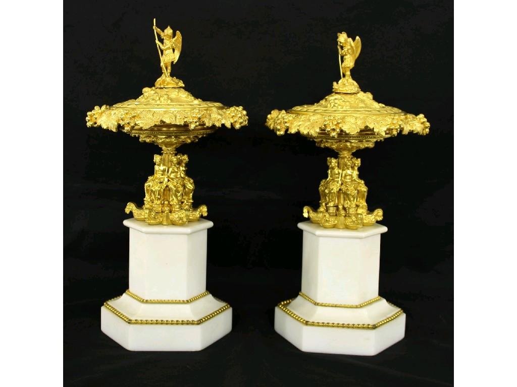 Appraisal: Pair of ormolu and marble cassolettes and covers the lids