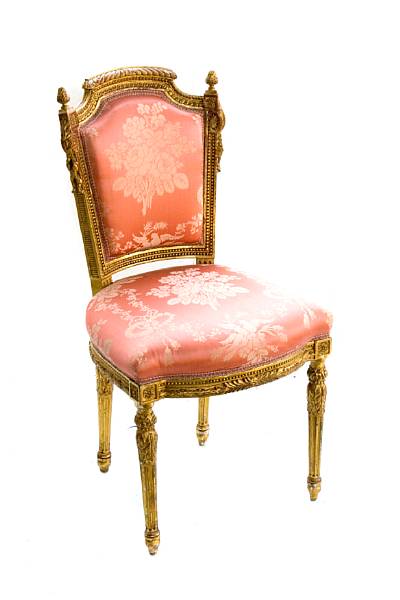 Appraisal: A pair of Louis XVI style giltwood salon chairs restored