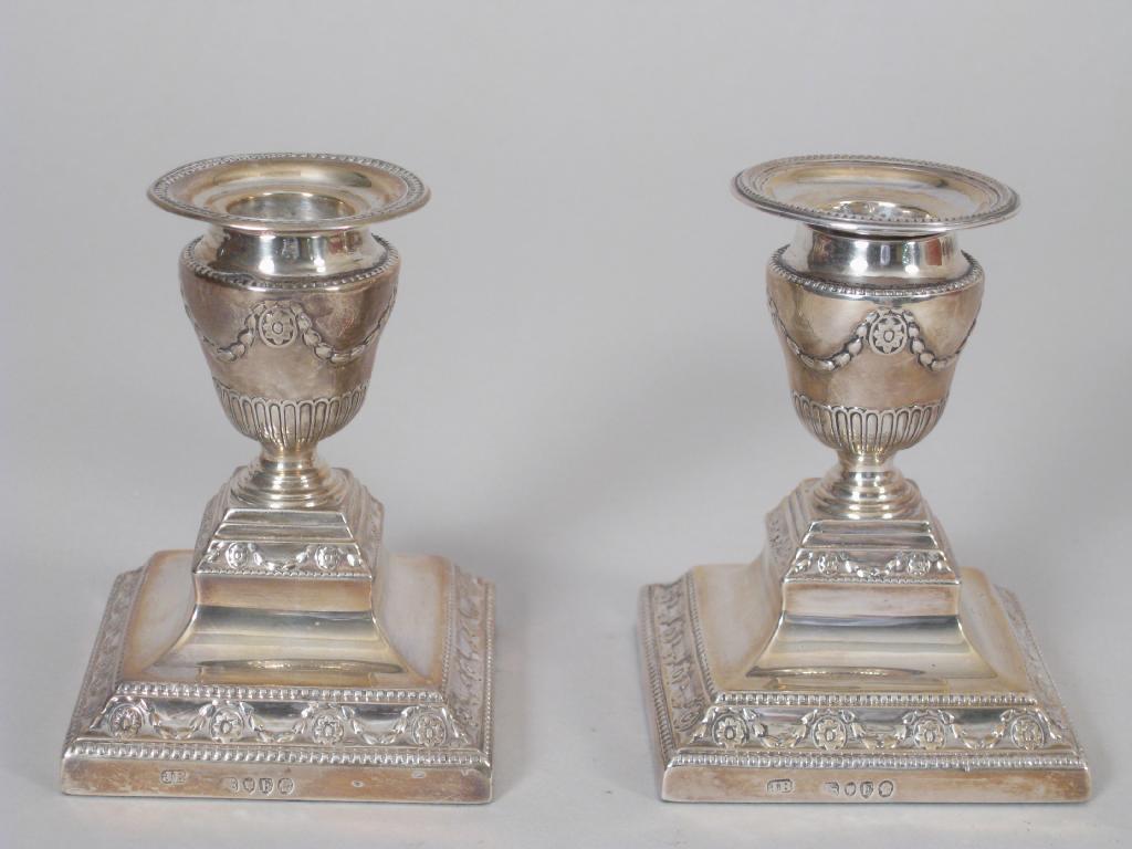 Appraisal: Pair of Victorian dwarf Candlesticks with frieze of swags and