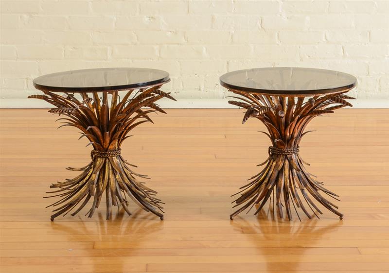 Appraisal: PAIR OF ITALIAN GILT-METAL AND SMOKEY GLASS LOW TABLES Each