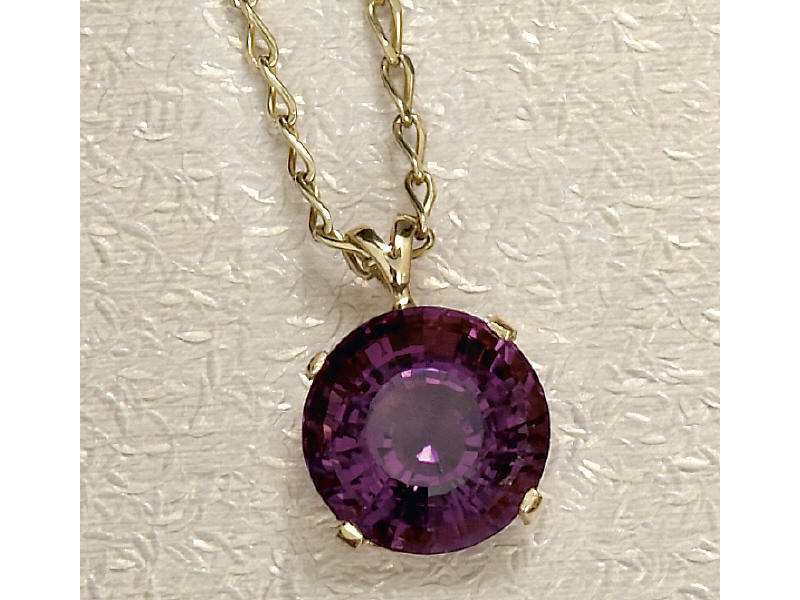 Appraisal: AMETHYST PENDANT k yellow gold pendant set with one round