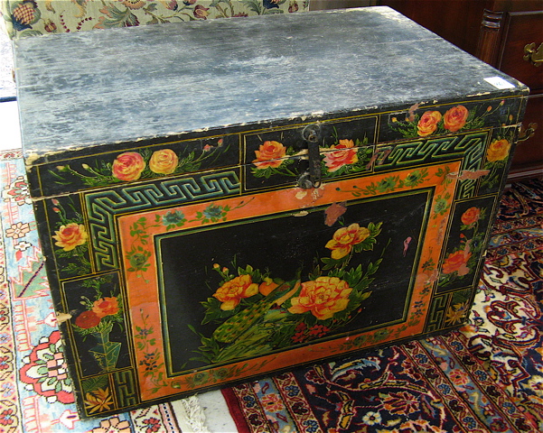 Appraisal: MONGOLIAN PAINT DECORATED PINE DOWRY CHEST having a flat lift