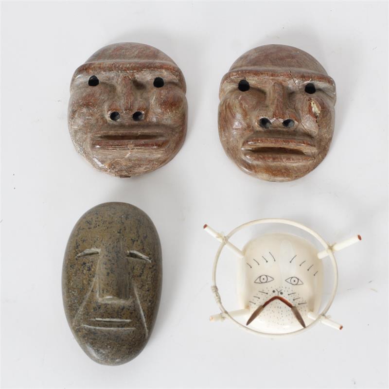 Appraisal: Four piece Inuit stone and ivory mask carvings H x