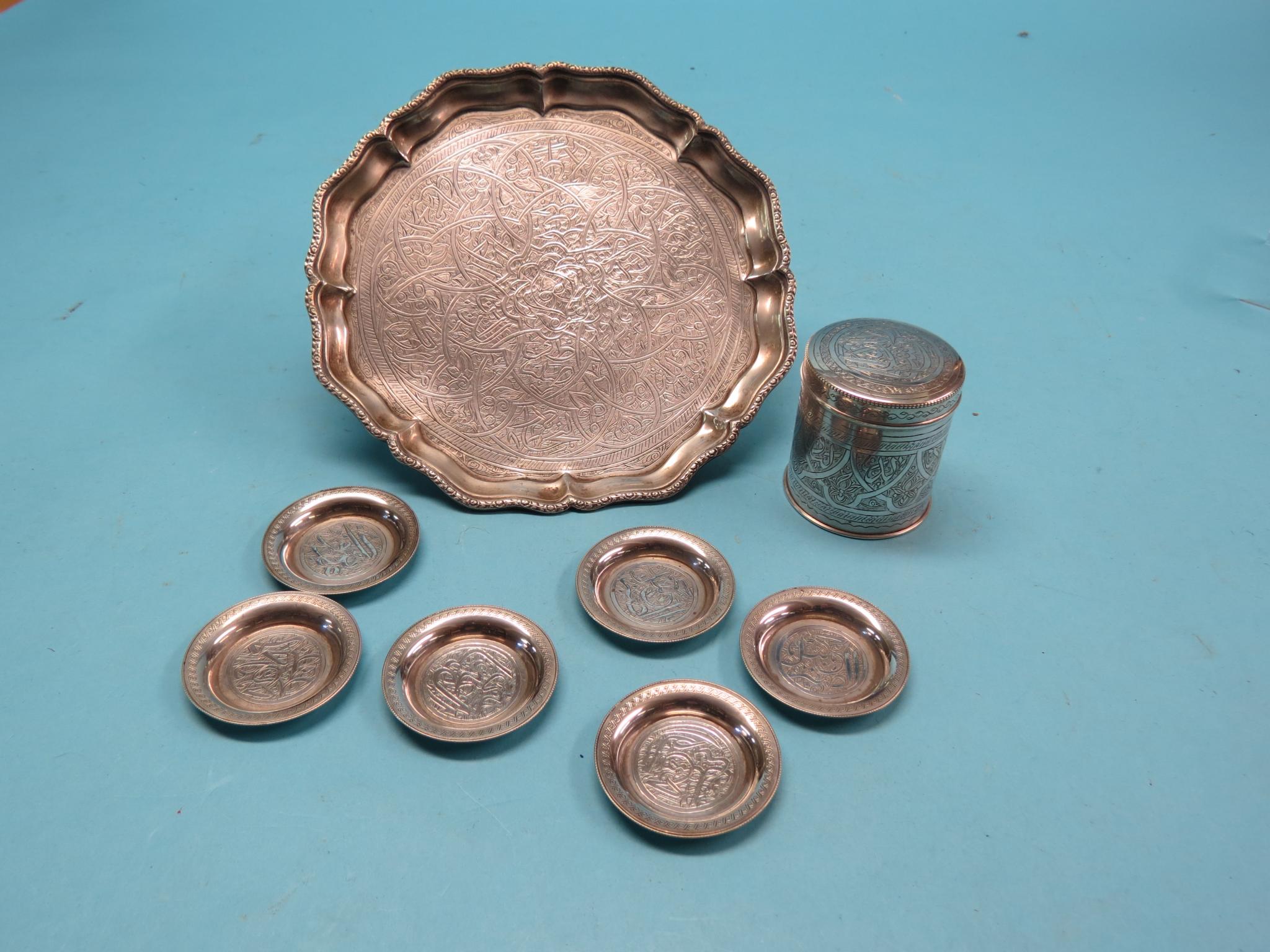 Appraisal: An Egyptian silver salver in together with a matching cylindrical