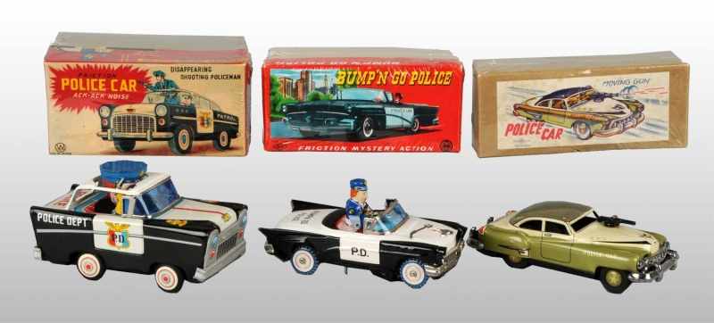 Appraisal: Lot of Tin Police Car Friction Toys Description Japanese Working