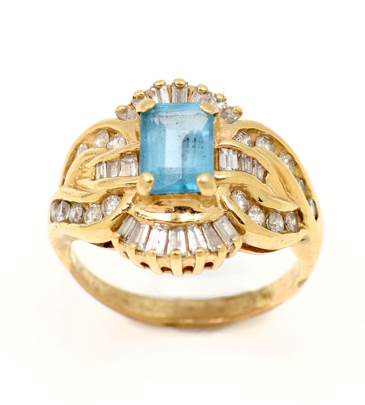 Appraisal: K TOPAZ DIAMOND RING K yellow gold topaz and diamond