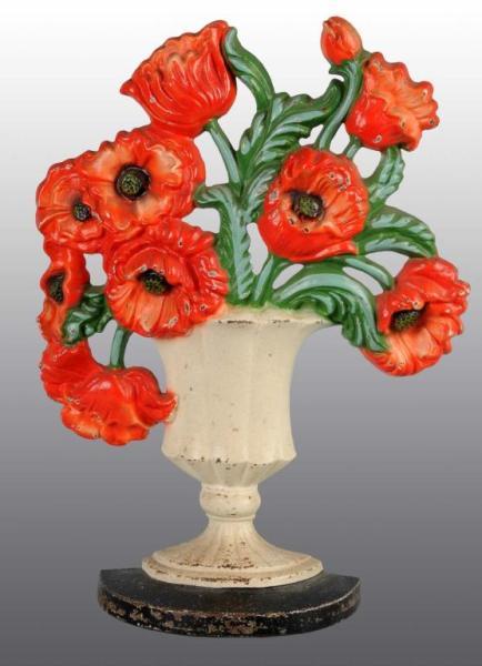 Appraisal: Cast Iron Poppies Doorstop Description Made by Hubley and numbered