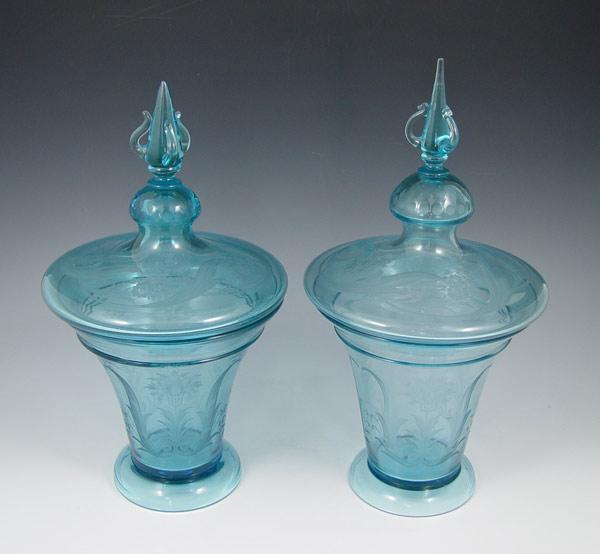 Appraisal: PAIR STEUBEN ENGRAVED COVERED VASES Celeste Blue shape Ca -