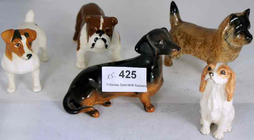 Appraisal: A collection of Beswick Dogs to include Bulldog Cairn Seated