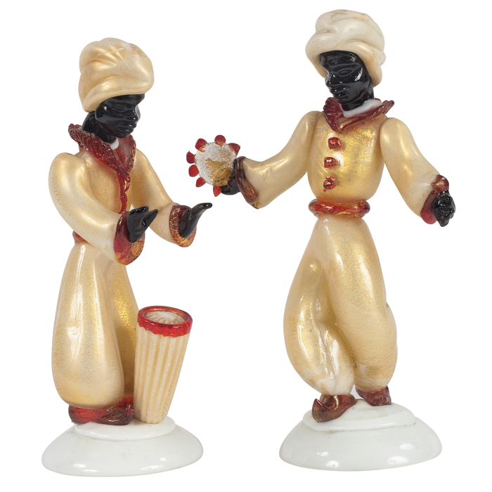 Appraisal: Barovier Blackamoor musician figurines two Murano Italy clear red and