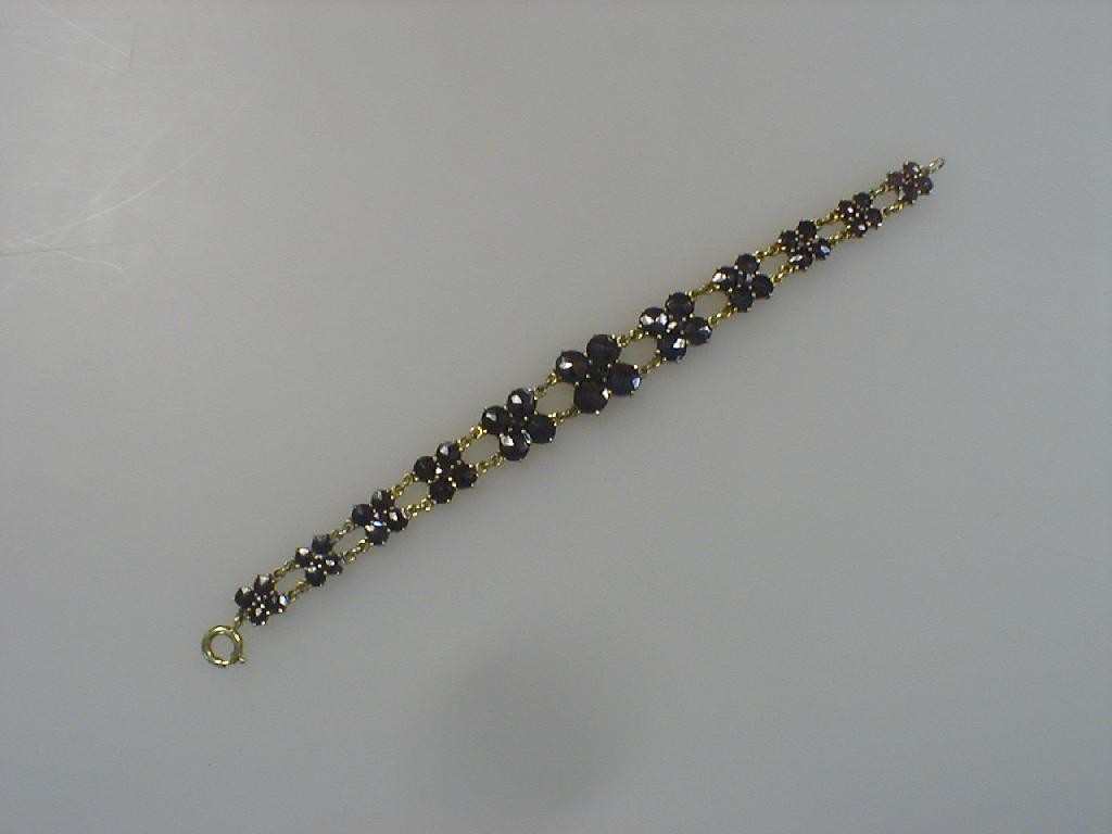 Appraisal: A garnet set bracelet in base metal