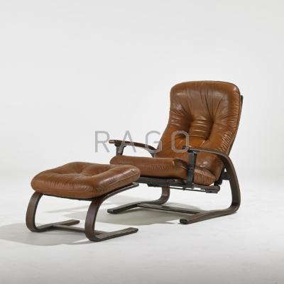 Appraisal: WESTNOFA Lounge chair and ottoman Norway s Laminated wood leather