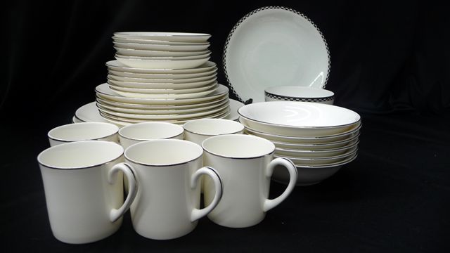 Appraisal: An extensive dinner service by Wedgwood in the formal platinum