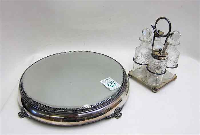 Appraisal: AMERICAN SILVERPLATED CASTOR SET PLATEAU MIRROR pieces The four bottle