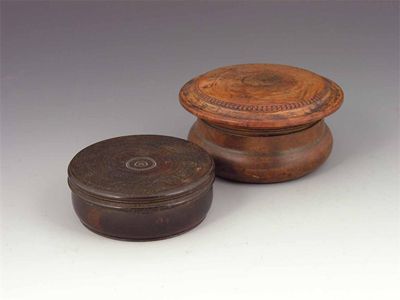 Appraisal: An early th century turned treen shaving bowl the cover