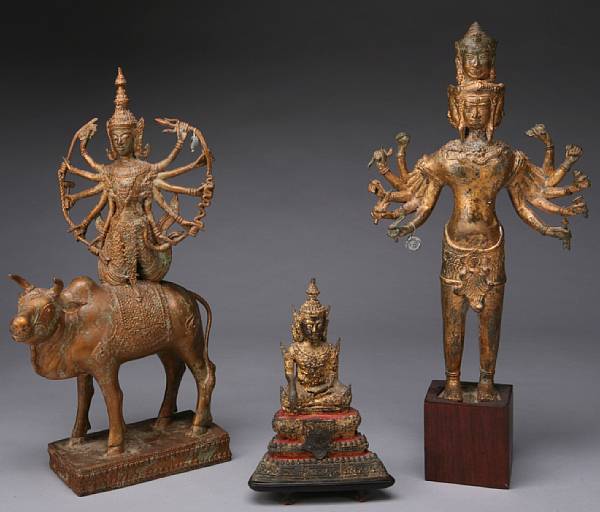 Appraisal: An Asian gilt metal multi-armed deity together with an Asian