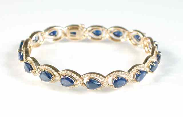 Appraisal: SAPPHIRE DIAMOND AND YELLOW GOLD BRACELET The k gold bracelet