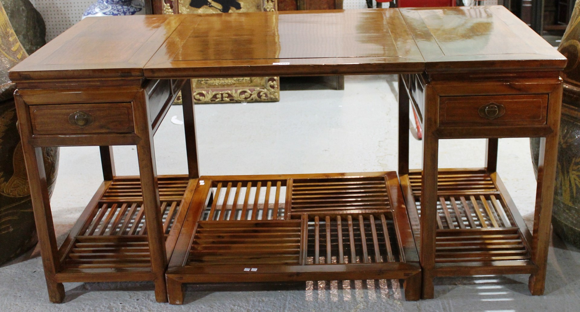 Appraisal: A th century Chinese hardwood writing desk each pedestal with