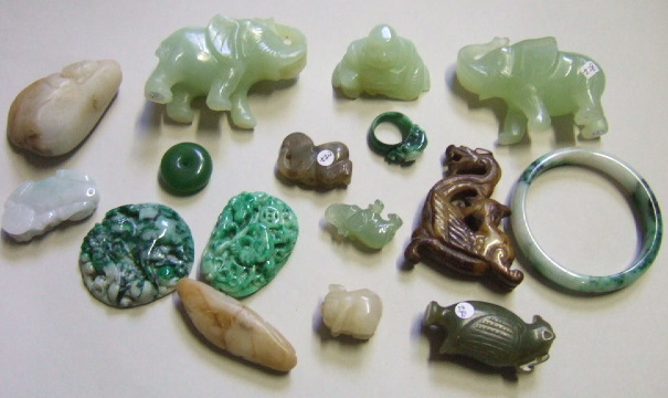 Appraisal: A group of jade carvings including a study of a