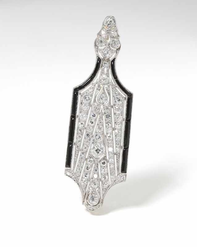 Appraisal: Art deco platinum diamond and onyx lorgnette brooch set with