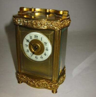 Appraisal: A GILT BRASS CARRIAGE CLOCK the single barrel movement with