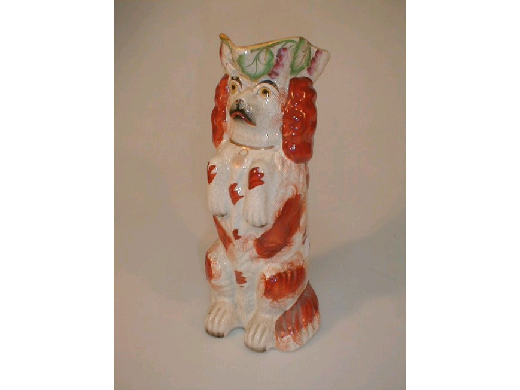 Appraisal: A thC Staffordshire pottery jug modeled as a begging spaniel