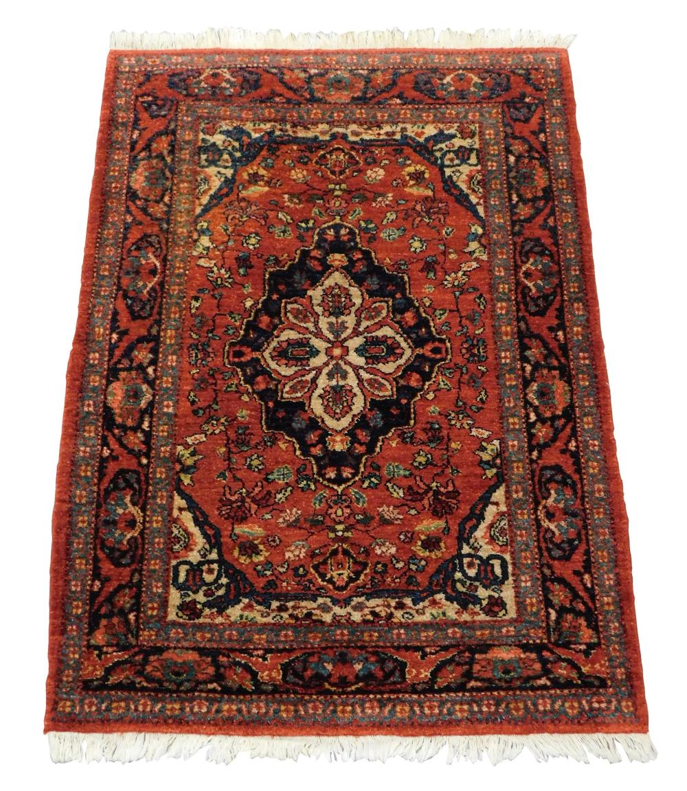 Appraisal: RUG Modern Sarouk wool on cotton red field with navy