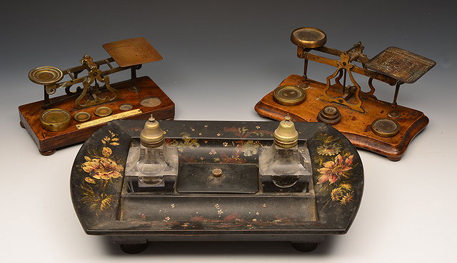 Appraisal: A VICTORIAN PAPER MACH DESK STAND with glass 'Pagoda' inkwells