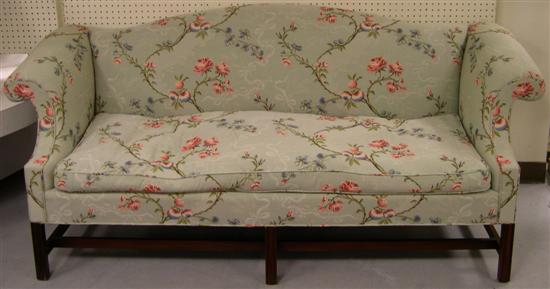 Appraisal: Chippendale style Camelback sofa with green rose and leaf upholstery