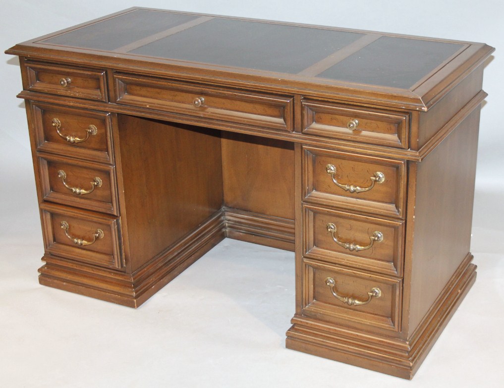 Appraisal: A thC twin pedestal desk the overhanging moulded rectangular top