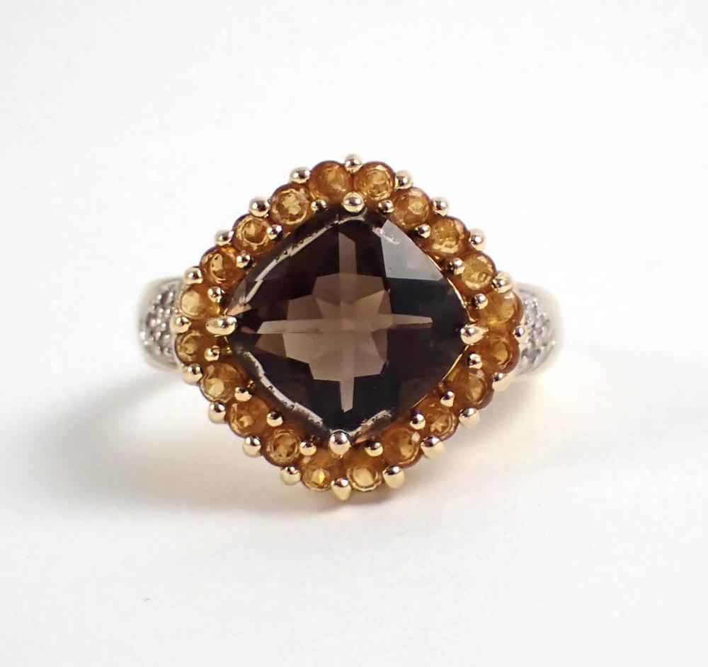 Appraisal: SMOKY QUARTZ CITRINE AND FOURTEEN KARAT GOLD RING with six