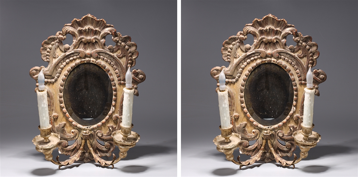 Appraisal: Pair of rococo style electric wall sconces with mirrors as-is