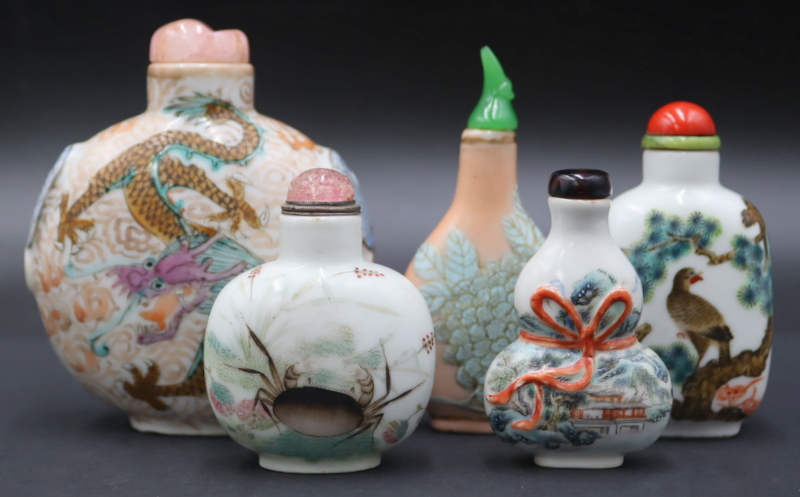 Appraisal: CHINESE ENAMEL DECORATED SNUFF BOTTLES Includes a large Chinese enamel