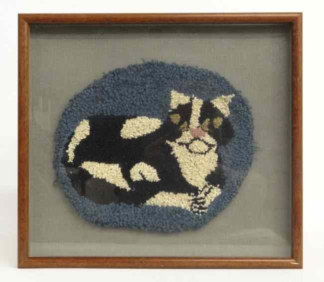 Appraisal: Framed cat hooked rug