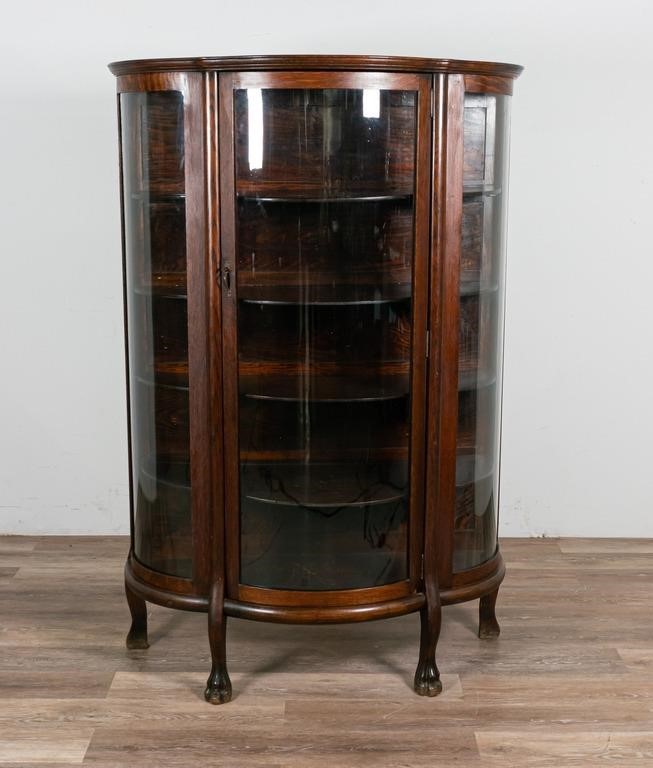 Appraisal: VICTORIAN BOWFRONT CURIO CABINETVictorian bowfront curio cabinet Early th century