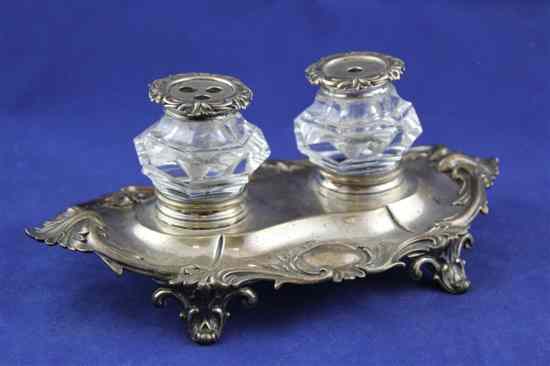 Appraisal: An early Victorian rococo style silver inkstand of oval form