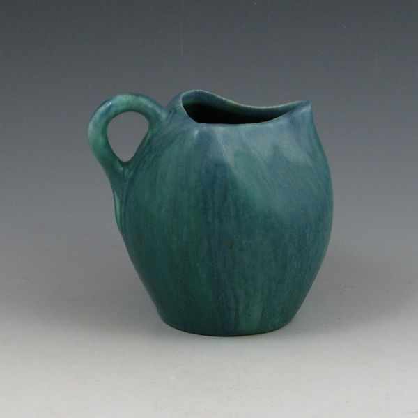 Appraisal: Muncie pitcher with excellent crystalline blue over green glaze Marked