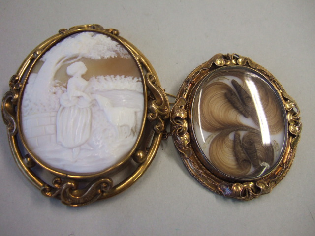 Appraisal: A Victorian large oval shell cameo brooch carved as the